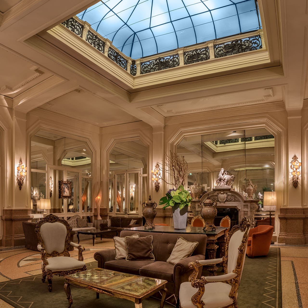 Interior image with stained glass ceiling and lounge hall in the Grand Hotel et de Milan