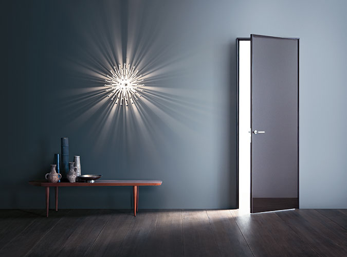 super door by lualdi with glossy surface in a modern coloured room