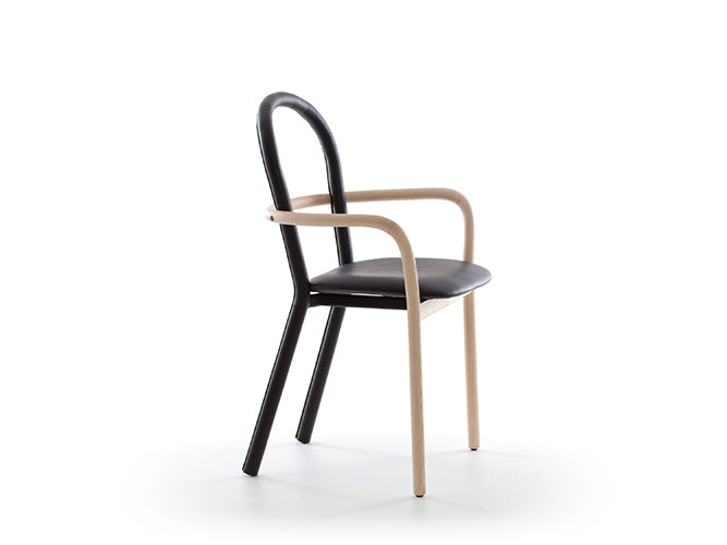 gentle chair by porro furniture with wooden structure and seat in leather