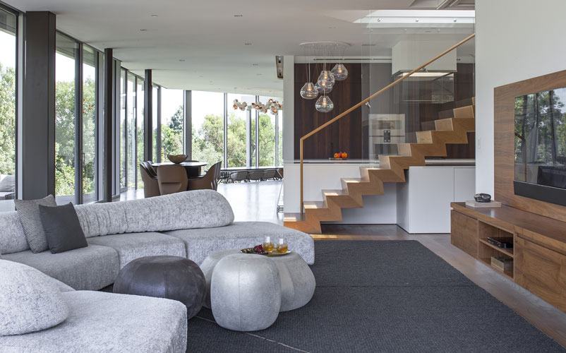 on the rock sofa by edra in a living open space designed by one of the top interior designers in los angeles