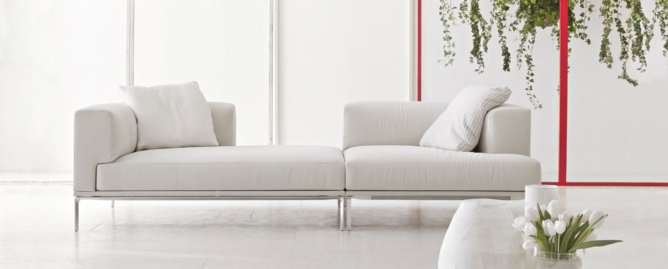 Moov sofa with white leather covering and Cassina sofa price
