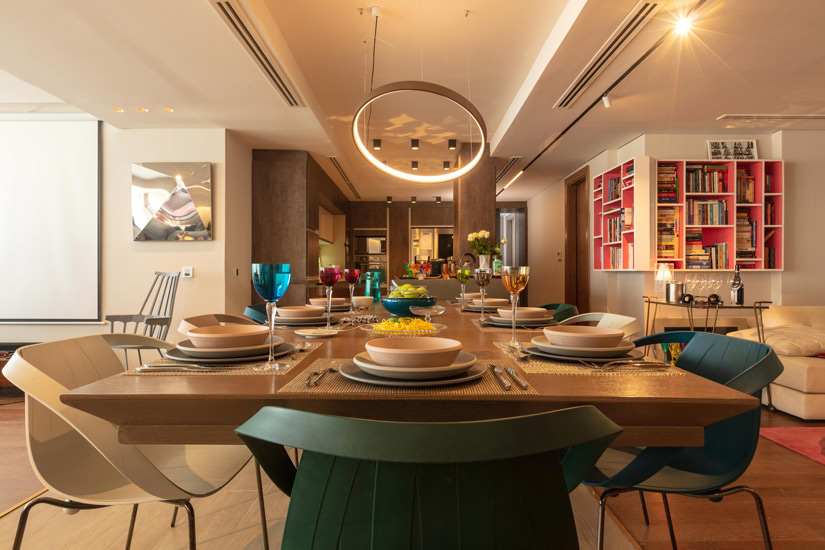Pop colors and eclectic style for this Dining room designed by Aura Egypt, one of the Design studios we selected in our list of the top interior designers in Egypt