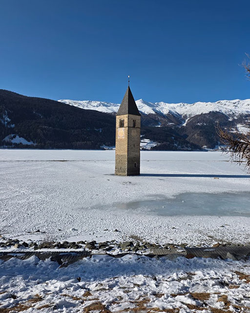 The church in the middle of Lake Resia, picture taken during the visit to the cave